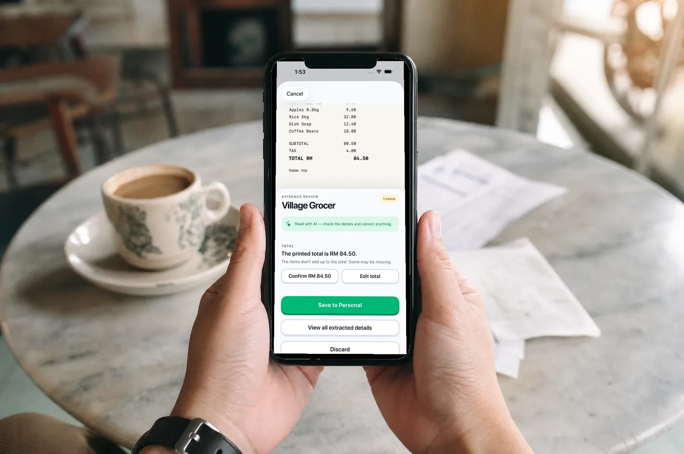 Hands holding an iPhone showing Pip’s evidence review screen, with the receipt and a question about the total